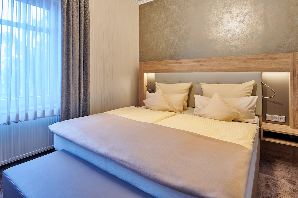 Ambient-Hotel zum Schwan, Gelsenkirchen-Buer Foto Bett im Doppelzimmer